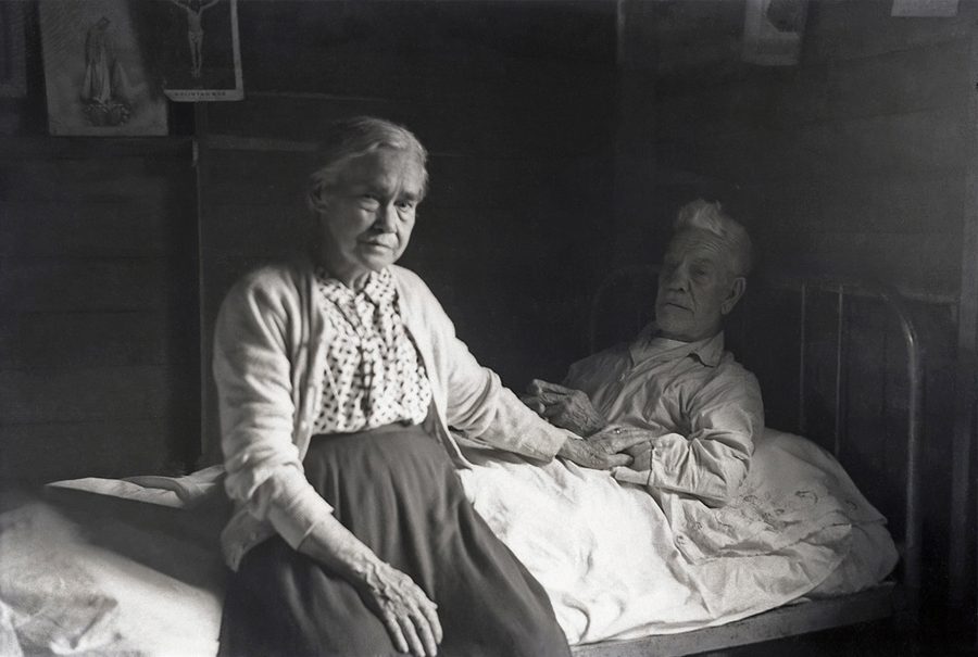 Beside Her Ailing Husband